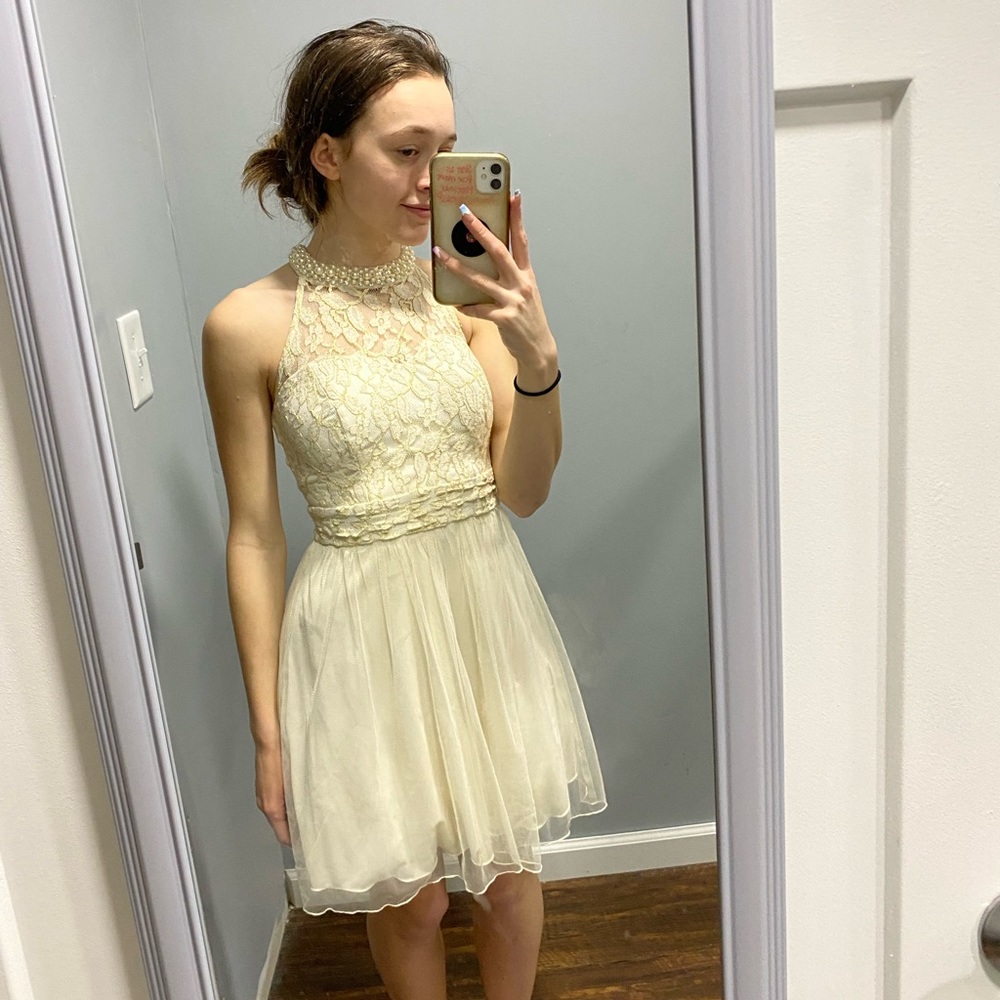 Gold and cream halter cocktail dress. Lace, sparkle, and pearl details
